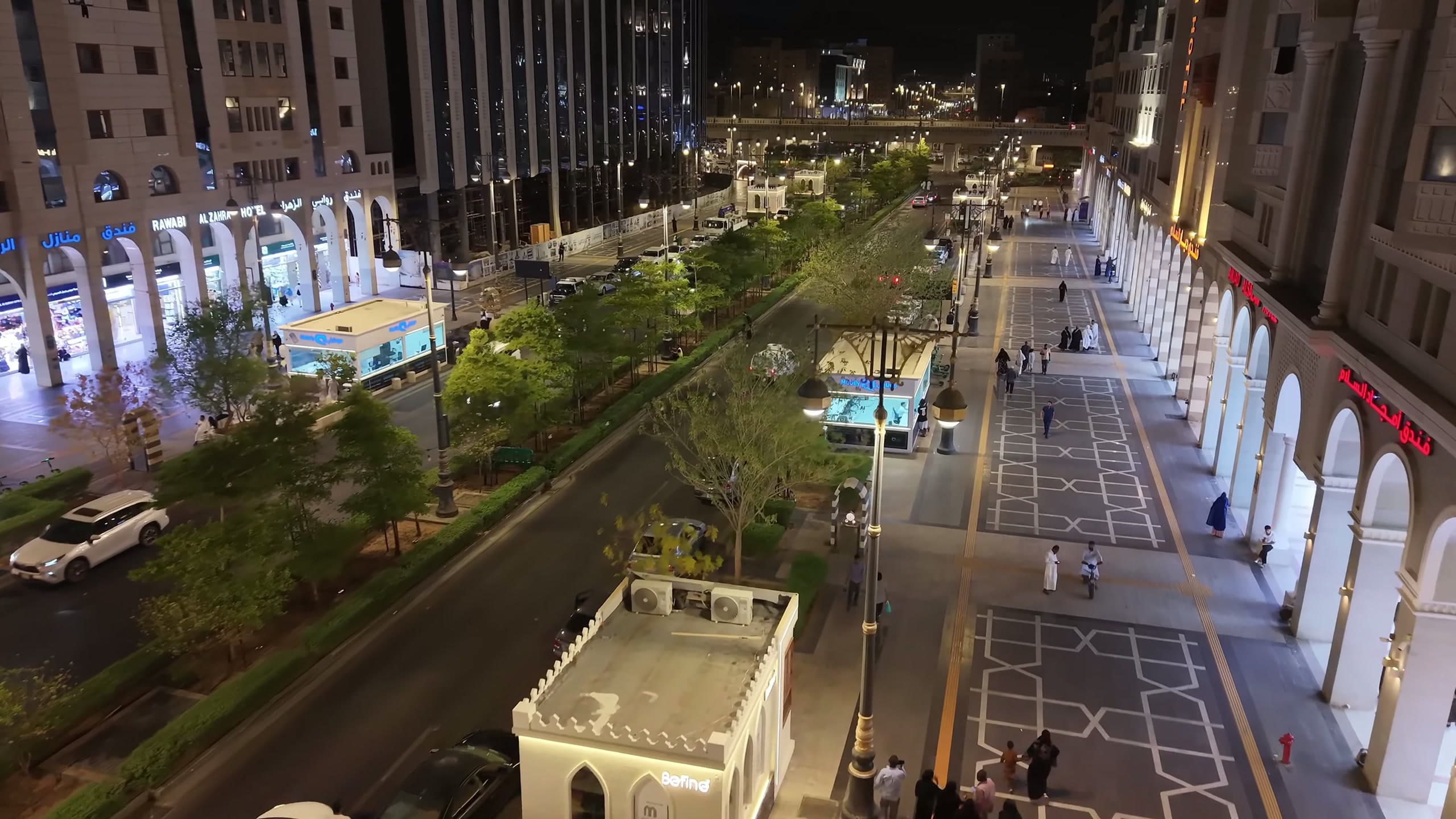 Elevated night view of the Central Area corridor with lighting columns along the roadway and pedestrian routes