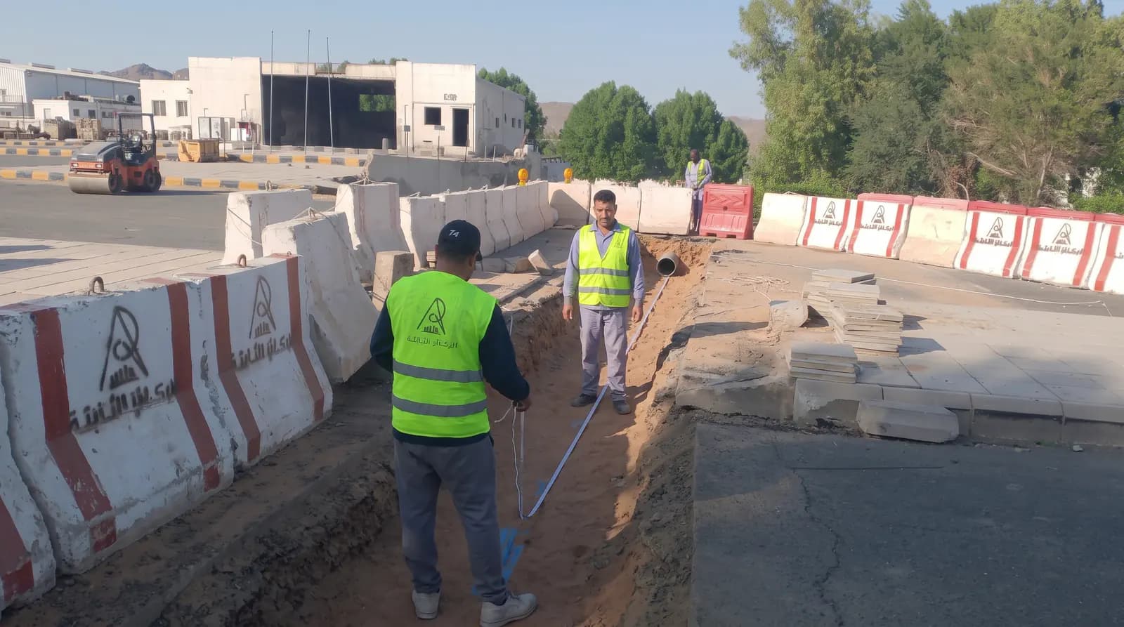 Work-corridor preparation behind safety barriers