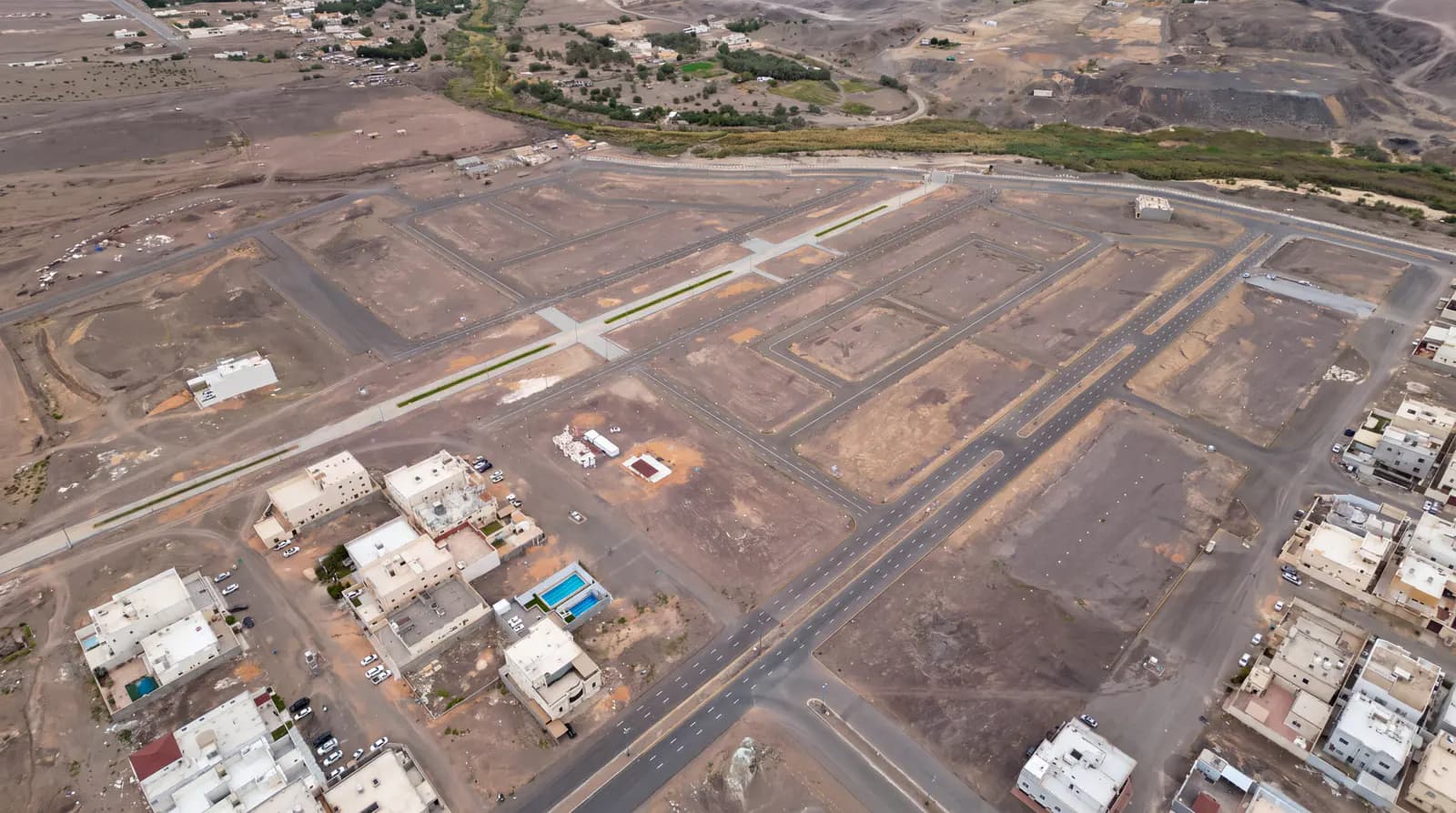 Aerial view of the road network and land parcels during development of a private scheme